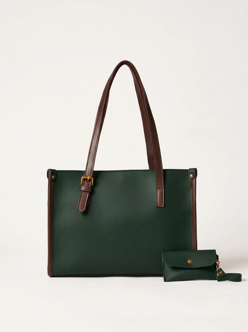 A dark green leather tote bag with brown leather handles and trim, shown next to a matching small green wristlet pouch on a light gray background.