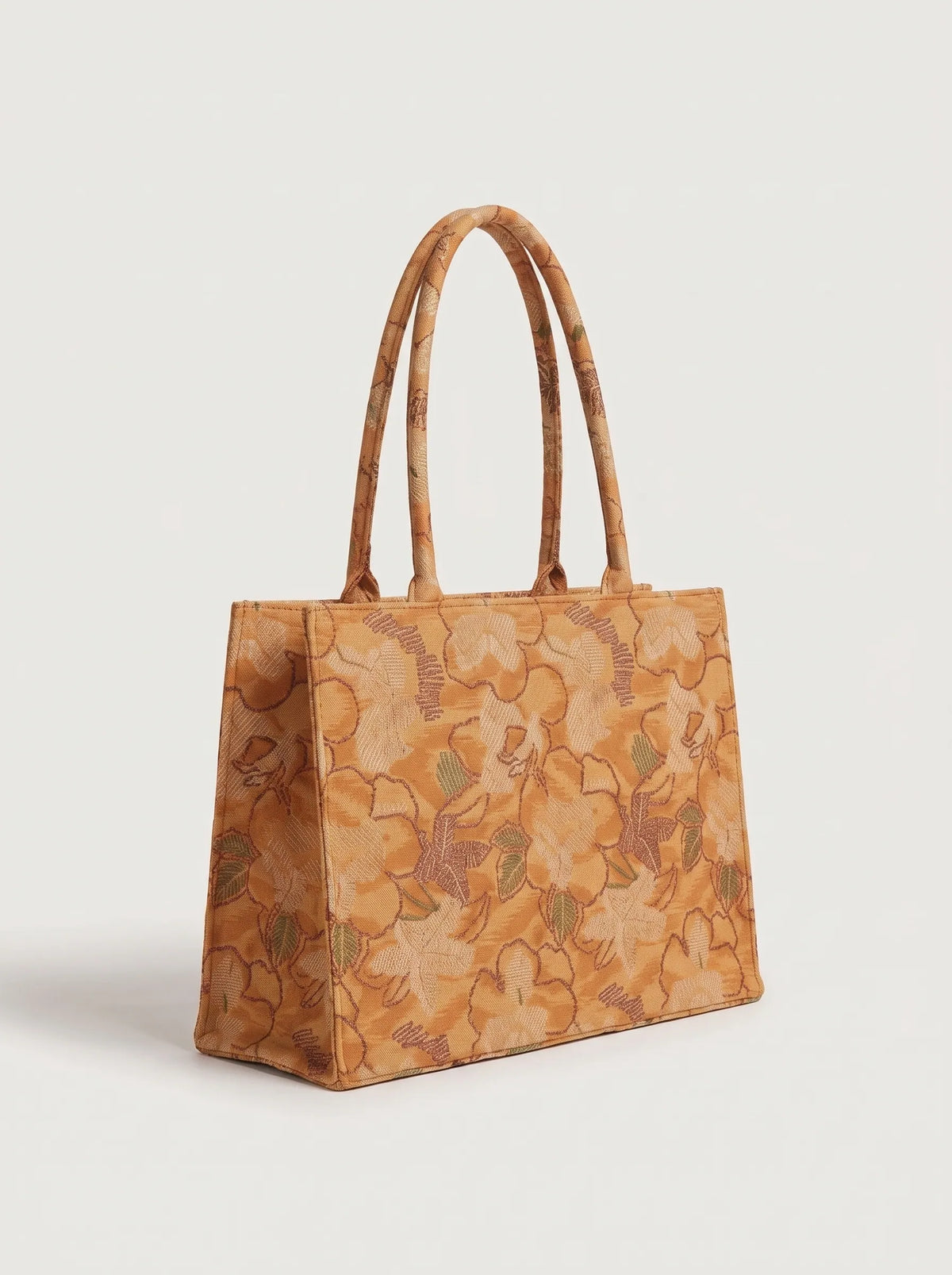 Side view of mustard canvas tote bag showing 4 inch depth