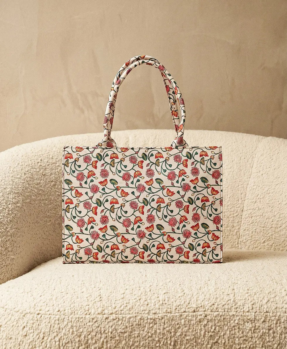 Side view of blush floral canvas tote bag showing 4 inch depth